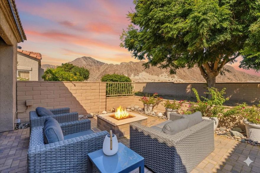 Available Immediately: Your Exclusive La Quinta Lifestyle Awaits in this exquisitely furnished, turn-key residence within the, guard-gated community of Laguna De La Paz. This home is more than a lease--it is your private resort retreat, perfectly suited for the seasonal snowbird seeking tranquility or a discerning long-term tenant desiring a maintenance-free, luxury lifestyle. Step inside a beautifully remodeled 1,980 sq. ft. sanctuary offering three bedrooms and three baths. The open, airy interior boasts elegant LVP flooring, a stunning cultured stacked stone fireplace, and a masterful primary suite featuring an expanded, tiled shower, a free-standing soaking tub. Every detail, from the new shaker cabinets and quartz countertops to the high-end appliances, has been curated for sophisticated comfort. The ultimate allure lies just outside: a very private, brick paver patio framed by majestic mountain views, complete with a soothing fountain and firepit for enchanting desert evenings. The home offers access to resort-style amenities, including fifteen pools and spas, a state-of-the-art fitness center, and tennis and pickleball courts all set against the Santa Rosa Mountains and the community's picturesque seven-acre lake. Location is paramount: you are steps from the world-renowned La Quinta Resort & Club and moments from Old Town La Quinta's upscale dining and shopping. With a fully furnished interior and an exceptional location, this lease offers immediate, effortless enjoyment of the Coachella Valley's finest amenities. Your unparalleled desert chapter begins here. Rates vary by season and length of stay. Inquire for more details.