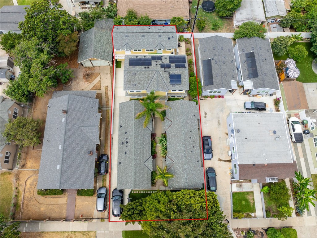 616-618 S Van Ness Ave is an 8-unit multifamily property in Santa Ana’s Heninger Park, offering a turnkey investment. It includes four 1-bed/1-bath and four 2-bed/2-bath units. In 2025, the front two buildings with four 1-bed/1-bath units were renovated, and two new 2025 ADU buildings which include a two-story, two-unit ADU and a garage ADU with an upper unit were built. The ADUs are exempt from Santa Ana rent stabilization, allowing flexible pricing.
The property has a new 400-amp panel electrical system, tankless water heaters, paid-off solar panels for the middle building, coin-operated laundry room, and in-unit laundry hookups for select units. Located one mile from downtown Santa Ana, it offers access to schools, dining, and retail. Low-maintenance artificial grass and tenant-managed landscaping add appeal.