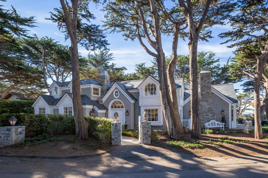 This is one of the few homes that has views of Carmel Bay with Pebble Beach Lodge and Golf Course in the background, and views of Stewart Cove and Point Lobos. In the 6,900 sq. ft., there are 6 bedrooms, 6 and one half baths, a nursery and a work out room. Upstairs is the master bedroom with a full bath and dressing area for her. In addition, an amazing office retreat with a separate bath and dressing area. The corner lot is 9,800 sq. ft. and provides privacy and world class views from both directions.