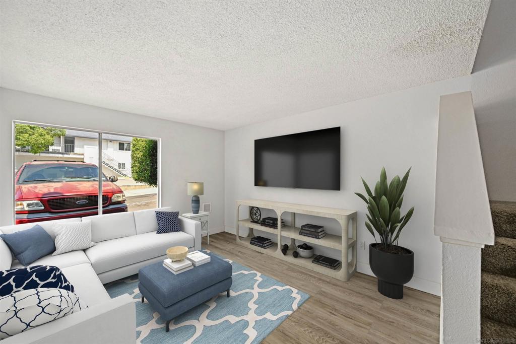 Affordable, stylish, and perfectly located! This upgraded two-story 2BR, 1.5BA townhome offers modern comfort in a central location. The remodeled kitchen showcases custom cabinetry, granite countertops, and stainless steel appliances. A dual-pane sliding door opens to the private rear patio, perfect for relaxing or entertaining. Enjoy luxury vinyl plank flooring throughout, ample storage under the staircase, and updated bathrooms with matching cabinetry and an upgraded shower upstairs. Both bedrooms feature custom closet organizers, plush carpet, and ceiling fans for year-round comfort. The assigned parking space is right in front of the unit for ease of access. Situated in The Grove community with a park right across the street, you’ll be just minutes from freeways, shopping, dining, and the charming Downtown Lemon Grove Village—with convenient access to public transportation. Don't let this opportunity pass you by!