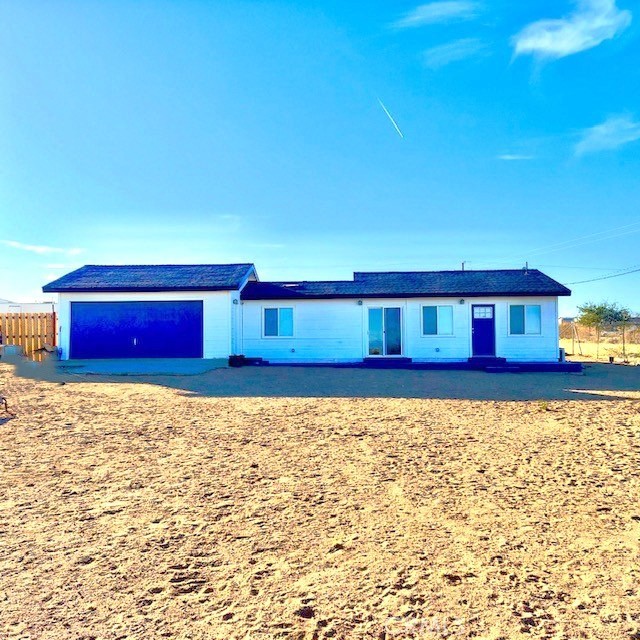 PRICED FOR QUICK SALE! Welcome to your high desert oasis! This move-in ready home in Landers, CA, is priced to sell and offers modern amenities on a serene 5-acre desert property rich with plant and animal life. Built in 2022, the home features new energy-efficient electrical systems including solar panels, a 24,000 BTU mini-split A/C, vaulted ceilings, double-paned windows, updated plumbing, a tankless water heater, fire prevention sprinklers, security cameras, and an ADT alarm system. Inside, enjoy marble countertops, stainless steel fixtures, laminate flooring, and ample recessed lighting, all while large windows showcase stunning desert views. The 400 sq. ft. attached garage, complete with fire protection, offers space for storage, hobbies, or
entertainment. The property’s flat, undeveloped land holds endless possibilities, including space for an additional home, barn, or a desert garden. A fenced area on the south side is ideal for a garden, hot tub, or outdoor living, while the fully enclosed yard makes it perfect for pets. Don’t miss your chance to own this peaceful retreat with stargazing nights, proximity to The Integratron, Goat Mountain, Giant Rock, Pioneertown, and a short drive from Joshua Tree National Park. Welcome home!