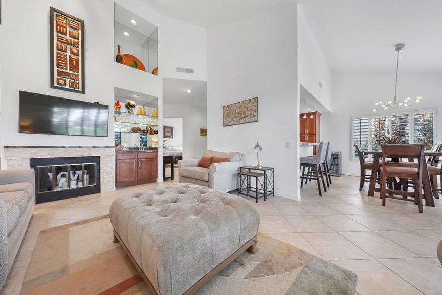 Welcome to this beautifully remodeled Champion III located on the 8th green of the prestigious Arnold Palmer Private Course at PGA West. With a serene mountain backdrop and stunning golf course views, this 3 bedroom, 2 bath condo offers the perfect blend of comfort, style, and desert elegance.Offered turnkey furnished, the home features thoughtful upgrades throughout. The kitchen has been completely renovated with sleek cabinetry, stainless steel appliances, quartz countertops, designer backsplash, and updated lighting. Vaulted ceilings and expansive windows fill the space with natural light, creating a warm and inviting atmosphere.The spacious primary suite includes a private courtyard retreat with a bistro set--ideal for morning coffee or evening relaxation. Both guest bedrooms feature brand new king-size beds, perfect for hosting family and friends. Additional upgrades include all new paint throughout, a brand new A/C (2025), new flooring, and a Pelican water softener system.Step outside to your private patio and take in the breathtaking views of the mountains and manicured fairways--perfect for entertaining or simply enjoying the peace and beauty of desert living.Ideally situated near world-class golf, tennis, pickleball, hiking, shopping, and dining, this is your chance to own a move-in ready getaway in the heart of PGA West.