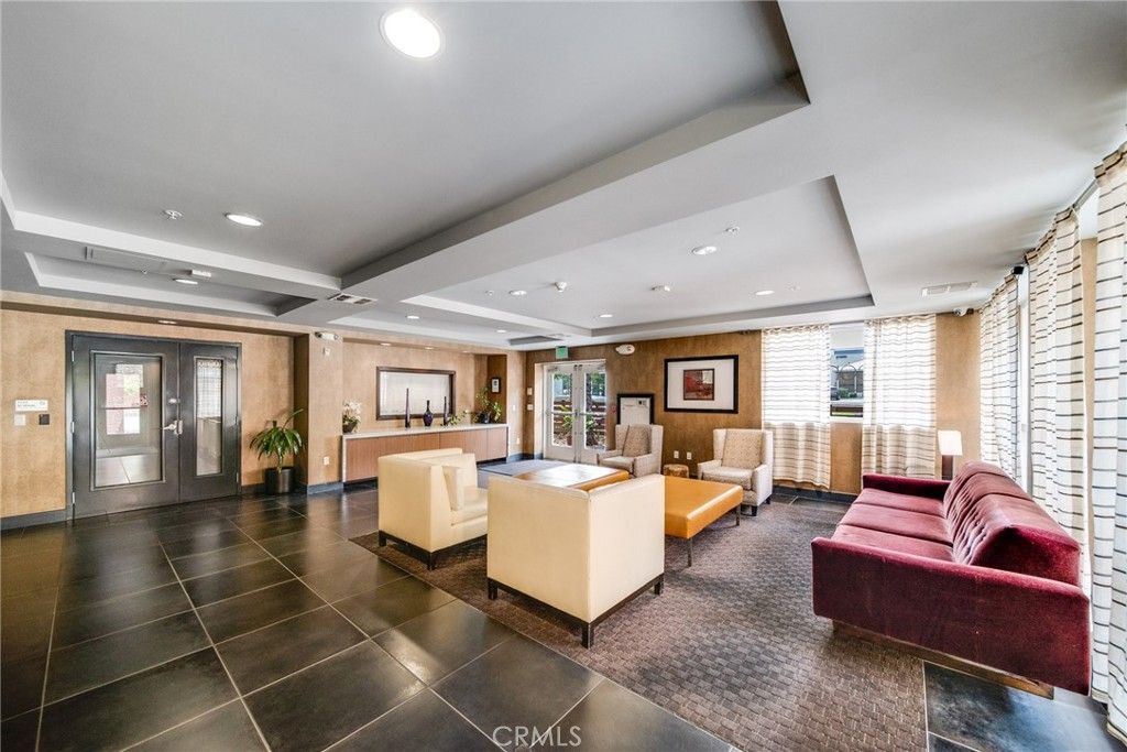 Photo of 21301 Erwin Street #303, Woodland Hills, CA 91367 (MLS # SR25131665)