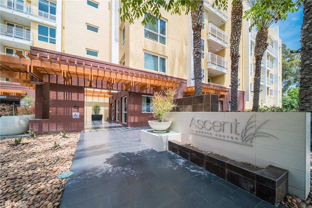 Photo of 21301 Erwin Street #303, Woodland Hills, CA 91367 (MLS # SR25131665)