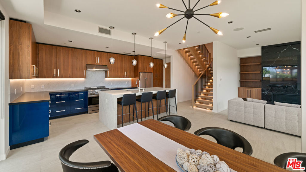 Located just moments from the beach in Santa Monica's sought-after Dogtown/Ocean Park neighborhood, 212 Bay Street is a brand-new construction offering the ultimate in Southern California living. This exclusive 2,000 sq ft home features 2 spacious bedrooms, 2.5 luxurious baths, and sleek modern design throughout. With only three units in the entire complex, it offers rare privacy along with two secure parking spots (plus the option to purchase a third) and a private rooftop terrace engineered to support a spa perfect for soaking in sunsets or relaxing under the stars. Just steps from Main Street's best shops, Urth Caffe, the beach, and the vibrant energy of Venice and Santa Monica, this is elevated coastal living at its finest. Please note some of the photos have been virtually staged/enhanced.