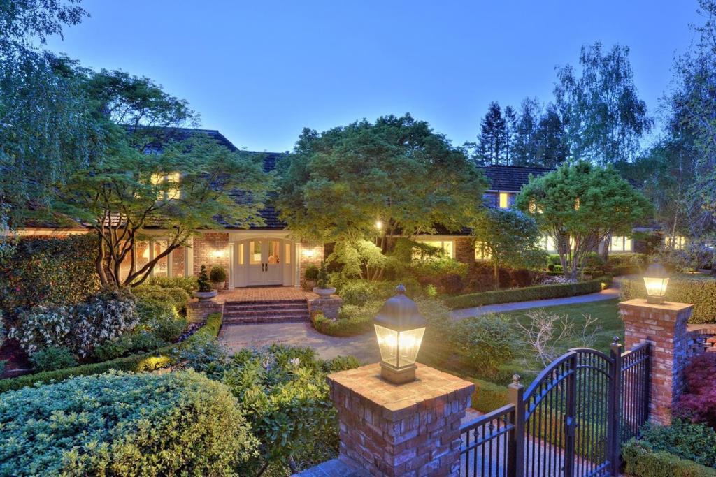 Situated on 1.32 acres, this English-inspired estate offers timeless appeal, impeccable entertaining grounds & a warm ambiance | Main residence: 8 beds, 7 baths & 2 powder | Exquisite, high-end finishes | Updated kitchen and baths | Newly renovated, separate guest house with full kitchen & bath | Pool & spa | Home gym | Stately, wood-paneled office | Recreation room with kitchenette | 5-car garage capacity | MP schools & walking distance to Sacred Heart and Menlo schools.