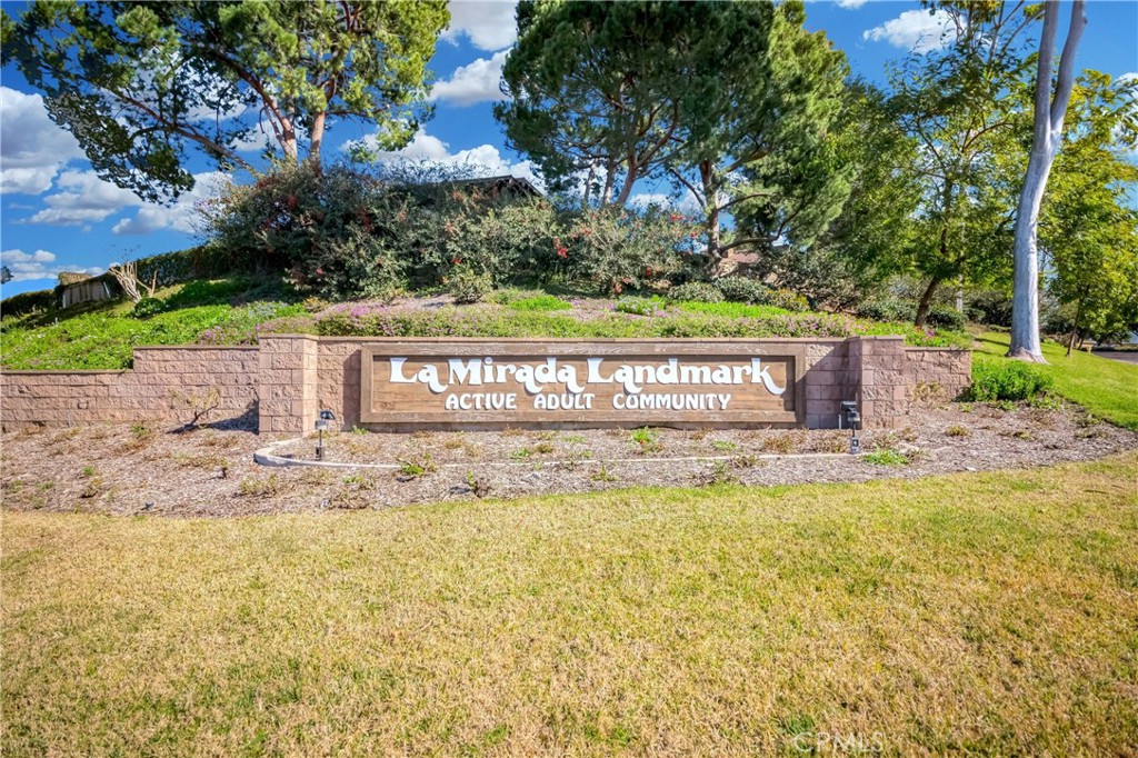 The beautiful La Mirada Landmark is an active 55+ adult community. This community has a 24-hour/7-day security guard. Beautifully upgraded 2-bedroom, 2-bathroom home is situated in a prime location and a tranquil neighborhood. The house features a living room with laminate flooring and new zebra blinds. The kitchen features upgraded cabinets, countertops, lighting, a brand new built-in microwave, stove, and refrigerator. The main bedroom includes a newly remodeled bathroom. There are enough parking spaces for guests, and the garage is located nearby. The community offers a range of amenities, including a swimming pool, spa, recreation room, BBQ area, tennis courts, gym, library, ping pong, and is within walking distance to the La Mirada golf course. Conveniently, it's close to markets, restaurants, and shopping.