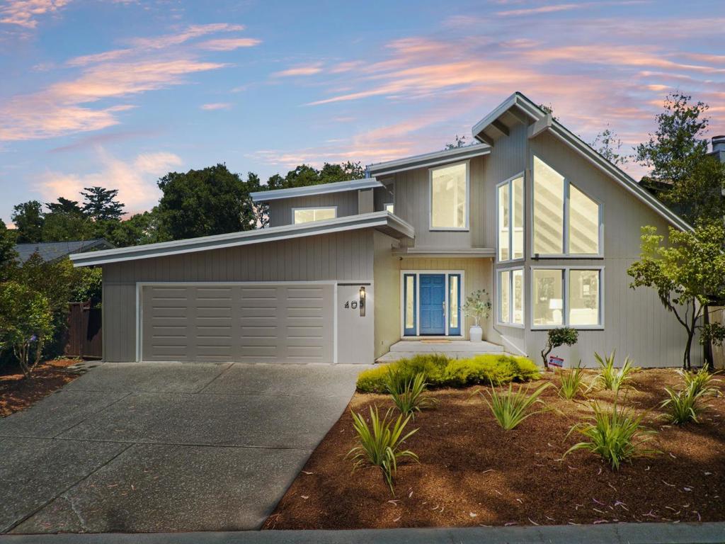 Sun-filled and inviting, this charming home features soaring open beam ceilings, abundant windows, and a cozy wood-burning fireplace in the spacious living room. The open layout flows seamlessly into a dining area and sitting space, perfect for both casual living and entertaining. The kitchen is well-equipped with Corian solid surface counters, an abundance of cabinetry, and a center island with a sinkideal for meal prep and gathering. The main bedroom is conveniently located on the first floor and includes a tiled bath with a soaking tub. Upstairs, a bright landing offers the perfect spot for a reading nook, home office, or study space, along with two additional bedrooms and a second bathroom. Outdoor living is easy with a private back deck and patio surrounded by mature greenery, offering a tranquil retreat for relaxing or dining al fresco. Located close to Seascape Golf Course, stunning beaches, and popular local restaurants, this home is a rare coastal gem.