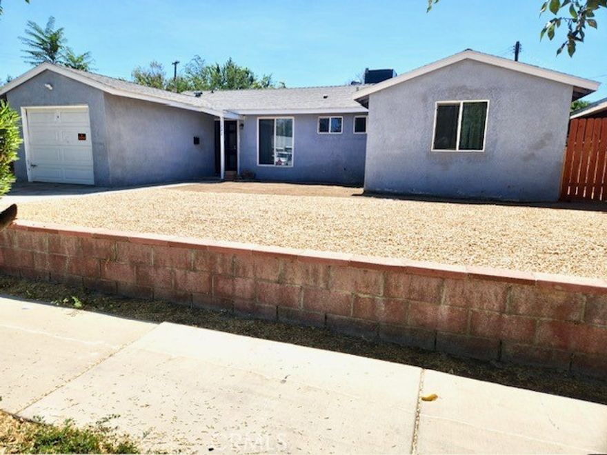 Beautifully remodeled single story home in the city of Lancaster with 4 bedrooms and 2 bath. Enter into a spacious living room with tile floors and picture windows allowing abundant natural light. The open floorplan flows to the contemporary kitchen with white cabinets, quartz countertops, stainless steel sink and pantry. The primary bedroom has a private attached bathroom and the 3 other bedrooms share the hall bathroom. Large back yard with area for entertaining. Located close to schools, restaurants and parks. Home is freshly painted and ready to move in!