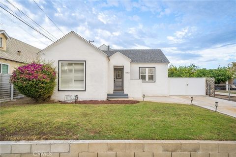 Photo of 1140 N Towne Avenue, Pomona, CA 91767 (MLS # CV25261799)