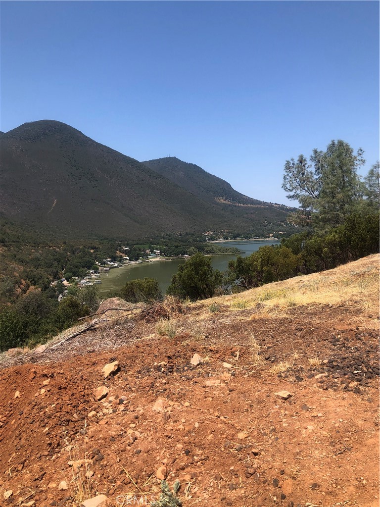 Build your dream home on this flag lot which is gently placed in a quiet cul-de-sac in Beautiful Kelseyville, CA. Septic tank already installed. There is a set of plans included with sale for a 2 story home. Situated high enough to provide you with a relaxing view to the largest natural body of water in the state of CA. With the wine industry growing in the neighborhood, now is the time to buy!!!