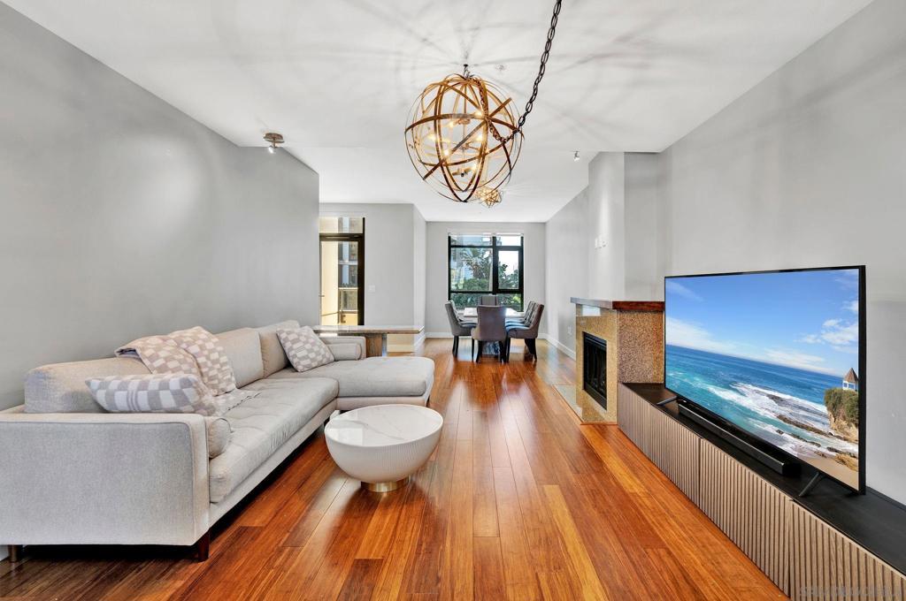 Tucked within the iconic Electra tower, this rare townhome-style condo blends high-rise luxury with the feel of a private garden retreat. Thoughtfully designed, the home features sleek modern finishes, an inviting walk-out balcony, and a rare private rooftop terrace - perfect for morning coffee, sunset lounging, or entertaining! Set amid lushly landscaped greenery, this residence sits on the same level as Electra’s full suite of resort-style amenities. From the sparkling pool and hot tub to the sauna, steam room, BBQ area, and state-of-the-art fitness center, everything is just steps from your door - effortless living, elevated. Perfectly positioned close to San Diego’s most beloved neighborhoods—including Little Italy, Seaport Village, and the vibrant Gaslamp Quarter—this home offers timeless elegance in the heart of the city. Perfectly positioned close to the best of Downtown—from Little Italy’s culinary scene to the waterfront charm of Seaport Village and the energy of the Gaslamp Quarter—this home offers timeless elegance in the heart of the city!