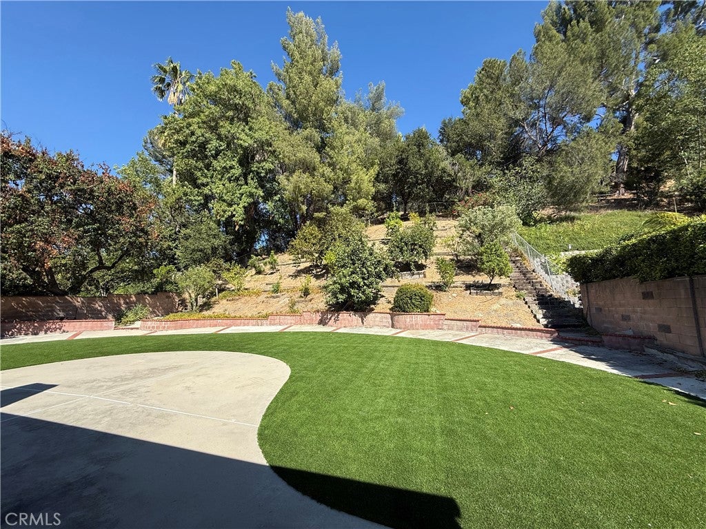 Photo of 5840 Valerie AVE, Woodland Hills, CA 91367 (MLS # SR26178106)