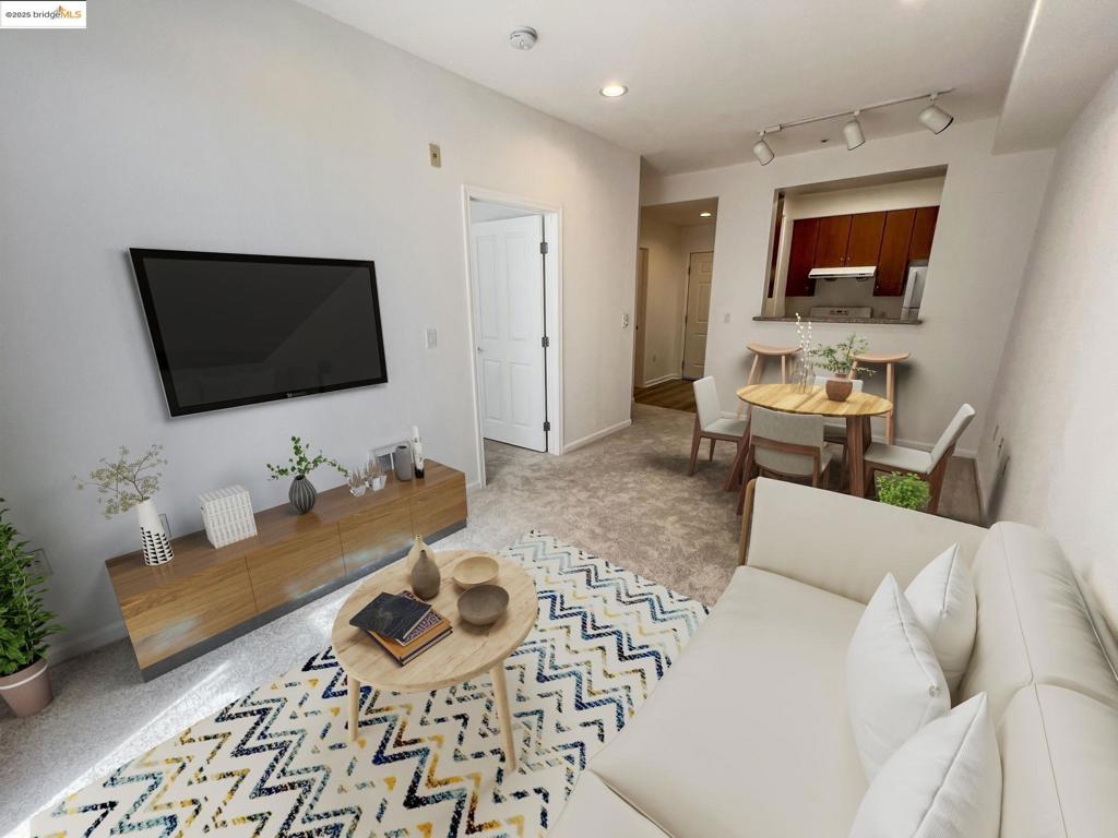 Top floor condo with city views and walkability! This sun-drenched one bedroom, one bath condo on the 6th floor of Franklin 88 not only features an open floor plan and a private balcony, but its location from the balcony offers a stunning view of the city, hills, and vibrant retail community of downtown Oakland, perfect for morning coffee or to unwind in the evenings. And per WalkScore, this unit boasts a score of 100 "Walker's Paradise!" Tasteful, modern updates include new flooring throughout, fresh interior paint, and new bathroom finishes. The kitchen features granite counter tops and overlooks the cozy living room and dining area. Other desirable amenities include in-unit washer/dryer, two separate closets, refrigerator, dishwasher, secured access to the building, one garage space, rooftop deck and a building courtyard, perfect for entertaining! Easy access to major freeways - 580, 880, 24. And just a 5 minute walk to 12th St BART, steps from Chinatown, the Farmer's Market, Swan's Market, Oakland Flower Market, Old Oakland - a food, shopping and entertainment destination, and many other shops and dining options adds to the desirability of this unit's location! Whether you're looking for a place to call home or an investment opportunity, this condo is a great find! Views: Downtown