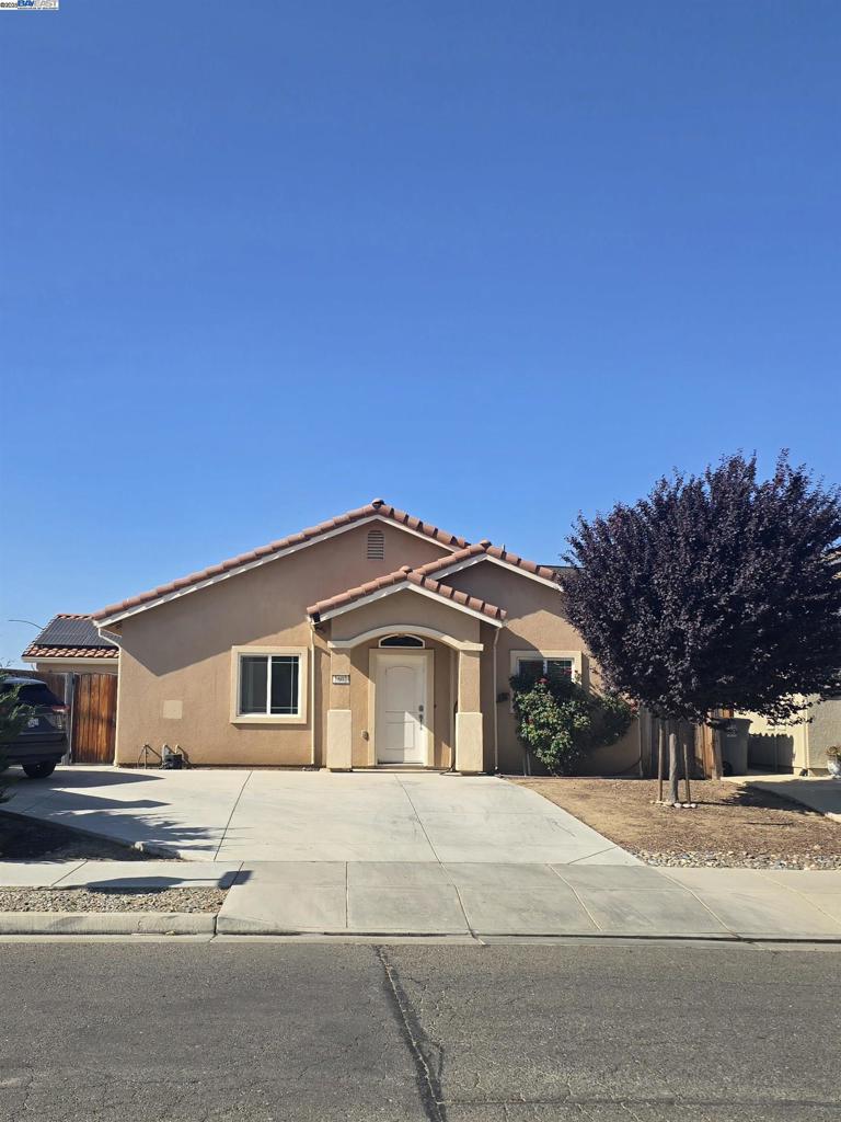 Prime Los Banos location—just a short walk to Walmart, Target, shopping, and dining. This well-maintained newer home sits directly behind Creekside Junior High School. The main residence offers 3 bedrooms and 2 bathrooms, featuring a spacious, contemporary layout that is currently vacant and move-in ready—ideal for an owner-occupant or new tenant. The property also includes two separately accessed rental units: an attached ADU and a converted garage unit, both currently occupied and together generating $2,375/month in rental income ($1,250 and $1,125/month; buyer to verify). An excellent opportunity for investors or owner-occupants looking to significantly offset their mortgage with built-in income. Located in one of Los Banos’ most convenient neighborhoods, close to shopping, schools, restaurants, and commuter routes. A rare find offering flexible living with strong income potential.