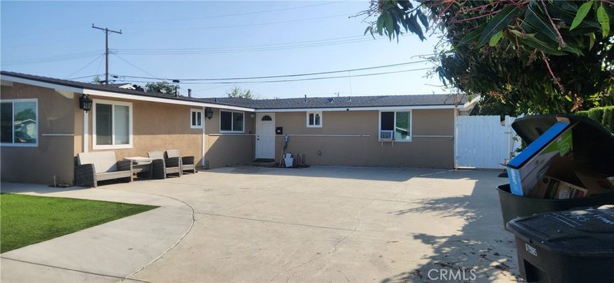 This beautiful home is centrally located to all adventure theme parks, 3 miles from Disneyland. Wow. This turnkey property SFR consists of 4 beds and 2.5 baths with an additiona Legal1-bed, 1-bath garage ADU built 4 years ago. The home was fully renovated less than 4 years ago. The home is fully furnished and being rented as a turnkey short-term corporate rental Air  B-N-B business. The home has a master bedroom that has been closed off from the main home, and the owner added a kitchenette, It has its own rear entrance and is currently being rented out also. The garage ADU and the master bedroom ADU serve as very good income for any first-time buyer looking to subsidize their mortgage payment and have a spacious remodeled 3-bed, 1.5-bath home in Anaheim with rental income. The home has lots of parking on the driveway for up to 6 cars, it is close to all theme parks, freeways, shopping, and nightlife. The home has been completely upgraded with a new roof, double-pane windows, exterior and interior paint, an electrical panel and fixtures, copper plumbing, kitchen cabinets with quartz counters, bathrooms, flooring, & all doors, new concrete all around the exterior, and a privacy block wall surrounding the back yard, some artificial turf has been installed in the front yard, and there is a large private backyard. The ADUs have mini-split A/C, and the home has newer window AC in each room. The home is in very good condition and is a must-see. Bring your fuzzy first-time buyers.