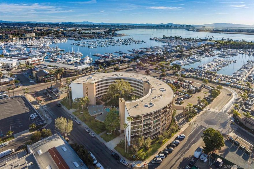 Rare opportunity to purchase at La Rondelet with southern exposure.  View the sunrises over the San Diego Yacht Club to the stunning sunsets over the La Playa hillside.  The convenience of coastal living with restaurants, marina, bayfront parks & much more just steps away.  Stroll to catch a concert or walk at shelter island and take in the views of the city.  Capture the essence of all the activity right outside your door along the marina.  Special features about this condo is the spacious 1648 sq ft and large patio.  The complex has everything you would want with heated pool, updated gym, spa, jacuzzi & community events. Entertainment with friends, family and neighbors by the firepit!  La Rondelet is sought after for it's wonderful lifestyle.  Make this home yours!