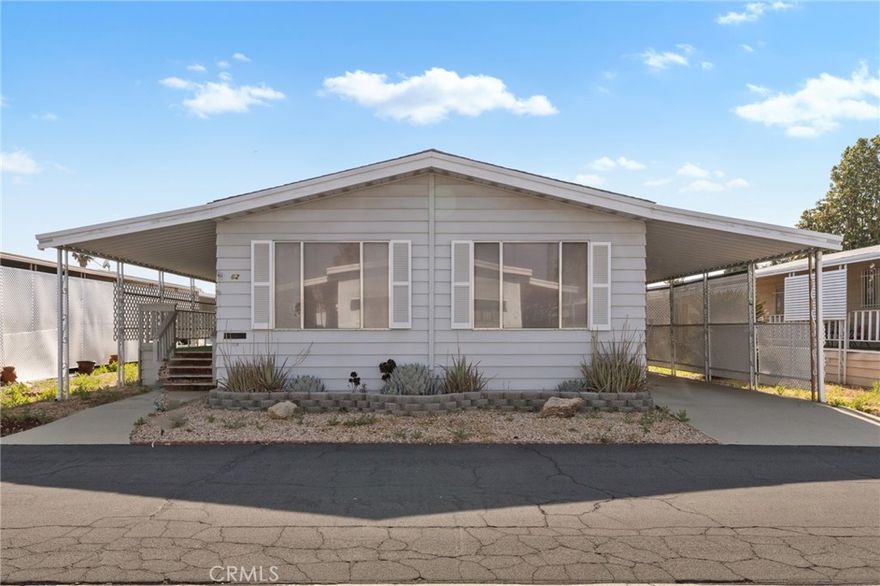 Roomy 2 bedroom 2 bath mobile home with light interior located in Eden Roc Villa 55yr+ senior park. Living/dining combo with built-in china hutch. Kitchen has gas stove, dbl oven, dishwasher, and extra counter space open to family room. Master has dual-sink vanity, garden tub, built in shelves. Guest bath has large low-step-in shower.  Forced heat and air plus energy-saving evaporative cooler. Ceiling fans. Covered patio. Security bars. Carport. Washer, dryer, refrigerator, shed included. All section 1 termite work has been completed. Just needs a little love and care.