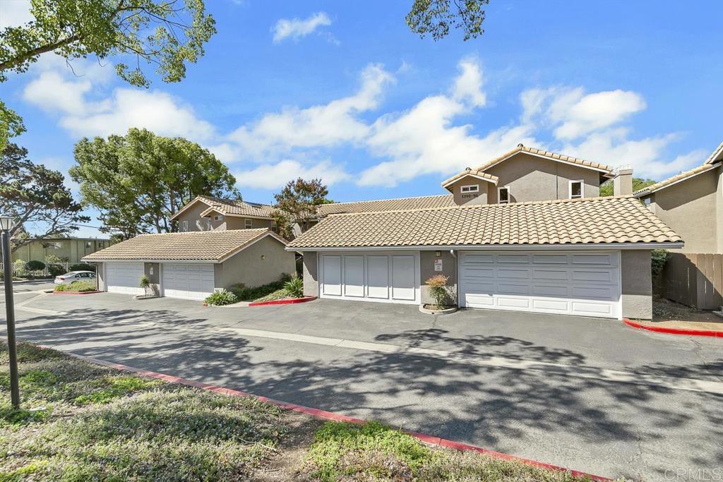 1390 Palomar Place is a well-maintained 3-bedroom, 1.5-bathroom townhouse located in a desirable Vista community. The home offers a functional floor plan with sizable living spaces, a well-appointed kitchen, and a private outdoor yard space with patio area. The two-car garage provides convenience and security for parking and storage needs. Recent updates and thoughtful finishes throughout create a move-in ready opportunity for anyone looking for a home with incredible pride of ownership. The community features landscaped common areas, a pool, and greenbelt walkways. HOA services include some exterior maintenance and upkeep of shared amenities. Conveniently located in North County San Diego, the property is minutes from Downtown Vista Village with its dining, shopping, and entertainment options. Local parks, recreation, and nearby freeway access make this a centrally positioned home with easy connections to daily living and recreational amenities.