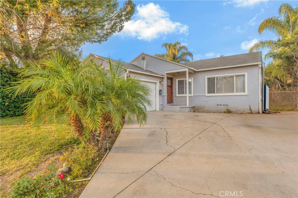 PRICE REDUCED — Investor Opportunity! Welcome to 19119 Lemay Street — a prime opportunity in the heart of Reseda, now offered at an investor-friendly price. This legally 3-bed, 1-bath home is currently configured as 2 bedrooms to allow for a more open layout — but the third bedroom can easily be restored. Set on a 6,129 sq ft lot, the 1,019 sq ft home has solid bones and a kitchen that’s already been tastefully updated with quartz countertops, a center island, stainless steel appliances, and sleek cabinetry — a great starting point for a renovation or flip. The rest of the home offers room for improvement, making it ideal for buyers looking to customize and add value. The spacious backyard features mature fruit trees and room to build an ADU, offering potential for extra income or multigenerational living. Located on a quiet residential street, close to schools, parks, and shopping — this home is full of potential. Bring your contractor and vision — this is a Reseda gem ready to shine. Possibly LEASE TO OWN OPTION OR POSSIBLE TO ASSUME 2.75% existing loan. Seller will consider 2/1 Buy down also. Also available for lease $3,000.