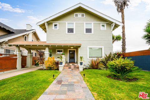 Photo of 1319 12th Avenue, Los Angeles, CA 90019 (MLS # 25591143)