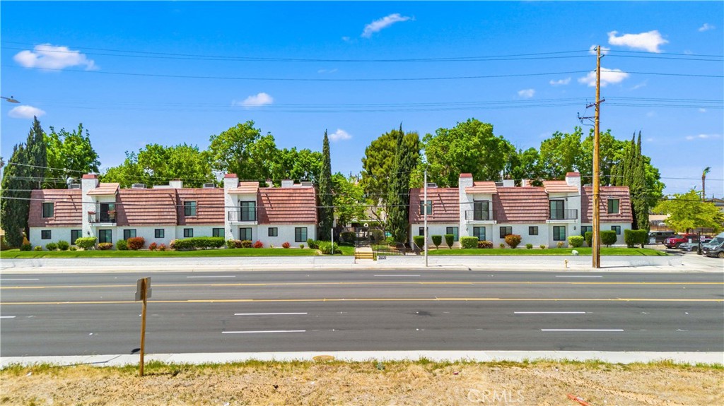 Ready for immediate move-in! This is a luxury townhome-style apartment, 1 bedrooms and 1.5 bathrooms, with 2 fireplaces, located within the premier gated rental community in West Palmdale, the Tenth West Townhomes. This community has been recently improved with new paint and new windows. 1 Small pet (under 25 lbs) is allowed. Prime location, very close to AV Mall, shopping, dining, gyms, Palmdale Regional Medical Center, and Plant 42 (Lockheed and Northrup). Right off the freeway for commuters to LA or Edwards AFB. Considered to be a high ''walk score'' location. This is not your typical apartment. There are no neighbors above or below, only to the sides. 2 story townhome design with 1 bedroom and 1.5 bathrooms. The kitchen, living room, dining area, and half-bathroom are downstairs. The bedroom (with walk-in closet) and full bathroom are upstairs. Fireplaces in bedroom and living room. Recently installed central HVAC system. Interior includes beautiful upgrades such as granite counters, stainless steel appliances (including refrigerator), wood-look durable flooring, and much more. There's also a small balcony off the bedroom. Water and trash service are included in the rent, no ''RUBS'' program. Reserved covered carport space is provided. The community is very nice, with a gated entry, pool, year-round heated spa, outdoor BBQ, laundry facilities, and mature trees. Professionally managed and well-maintained community. 6-month lease term. 700 credit score required. Excellent opportunity for a wonderful West Palmdale rental, unlike any other in the area.