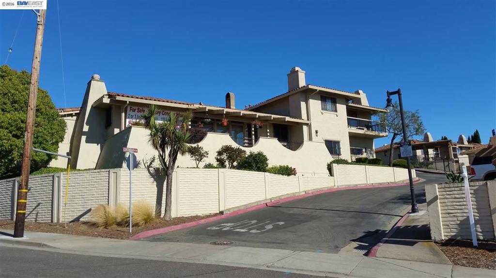 BREATHTAKING VIEWS! Enjoy awesome sunsets from floor 2 ceiling windows in living & master bdrms! This unique end unit high in the Hayward Hills has an expansive paving stone patio W/2 mature Japanese gardens. 2 master bdrm suites W/walk in closets, Den (poss 3rd bdrm?), updated kit & baths, & MORE!