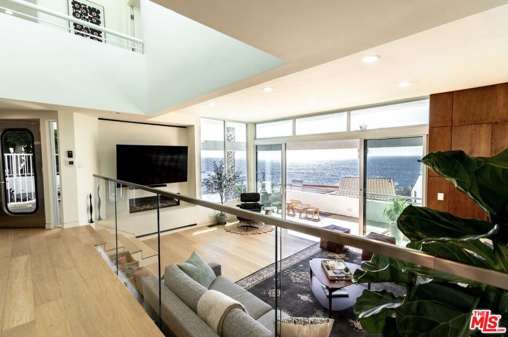 Enjoy breathtaking Ocean views from this recently remodeled home in Malibu's La Costa neighborhood for far less than it would have been just a few months ago. Along with views, this three bedroom, 2.5 bath home features modern lines, hardwood floors and skylights providing natural light. The open kitchen features modern appliances including an induction cooktop. Outdoor spaces include multiple decks / balconies and a patio with an in ground heated spa. Can be leased furnished or un-furnished. Ask about short term lease rates. *Photos show furniture no longer in the home.