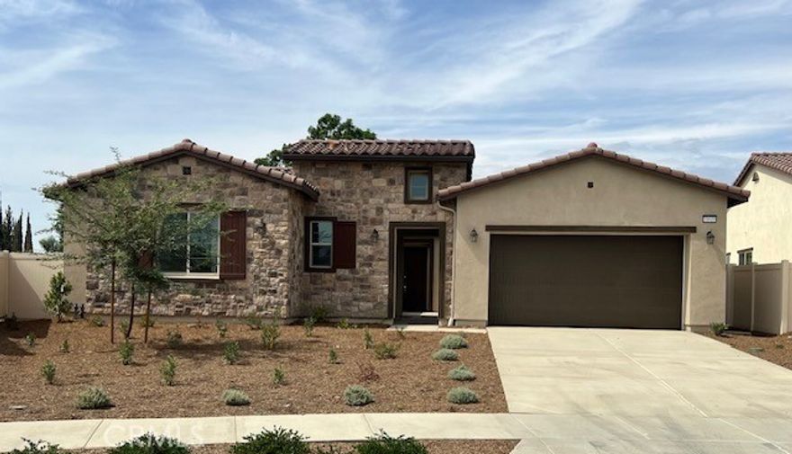 Discover this beautifully designed Multi-Gen home—perfect for extended living or flexible space needs! This must-see residence features an inviting private entry, a spacious great room, and a gourmet kitchen with white cabinetry, quartz countertops, built-in micro-oven and refrigerator, a walk-in pantry, and a large center island ideal for entertaining. Enjoy an open dining area and a luxurious primary suite complete with a generous walk-in closet and private bath. Additional highlights include a convenient laundry room, a covered patio for outdoor living, and a 3-car tandem garage. Ceiling fans are included in all bedrooms for year-round comfort.
