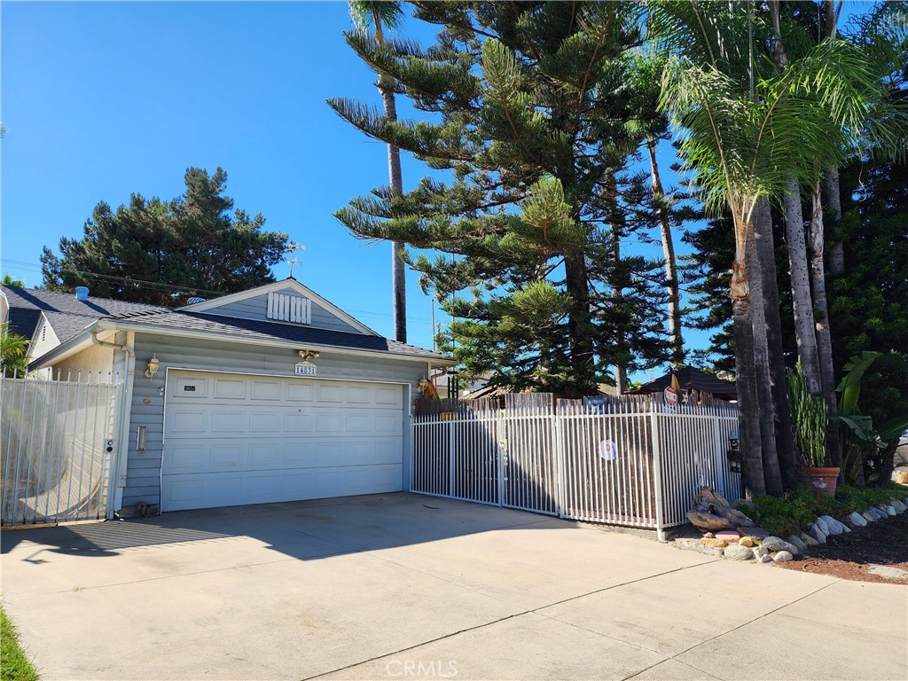Exceptional opportunity to own a large home with a sprawling oversized lot (11,296 SF) that backs directly to the horse trails along the San Gabriel River. This 3 bedroom, 2 bath home offers 1983 sq. ft. of versatile living space, including a huge open vaulted ceiling loft area. Whether you are an equestrian enthusiast, animal lover, or simply seeking a home with generous ample indoor and outdoor space. This is the one you have been waiting for, Don't miss this wonderful opportunity to own this home. City of Norwalk states that this property can have up to (3) HORSES.