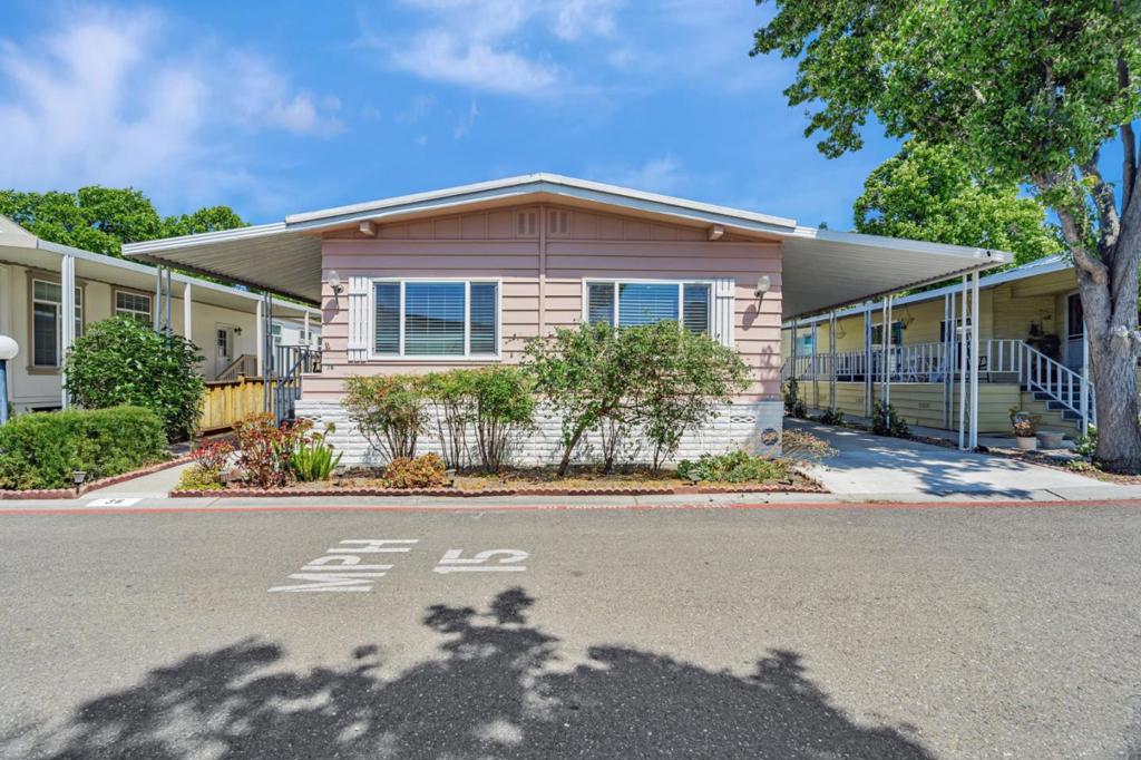 Charming and Affordable Manufactured Home in a Peaceful Senior Community. Welcome to this move-in ready, beautifully updated manufactured home, located in a quiet and friendly senior community. Featuring a bright and open floor plan, this home offers a separate living room and family room, a cozy dining area, and stylish upgrades throughout including dual-pane windows, laminated flooring, recessed lighting, and modernized bathrooms. The kitchen comes complete with all appliances, making it truly turnkey. Enjoy the added bonus of an enclosed screen room perfect for extra storage, hobbies, or a quiet retreat. Step outside to a private backyard and take advantage of a spacious driveway just steps away from guest parking. The home is conveniently located just minutes from the clubhouse and recreation center, offering an active and social lifestyle. Ideally situated near major tech companies, Seven Seas Park, light rail, and with easy access to highways 237, 101, and 85. Plus, you're just a short drive from shopping centers and a variety of restaurants. Dont miss this affordable opportunity to enjoy comfort, convenience, and community living at its best! Space rent to new owners $2,002/month.