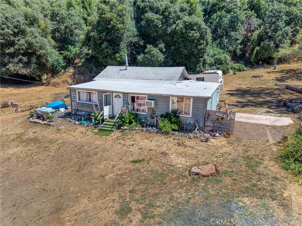 Welcome to your next great investment opportunity in Lucerne! This fixer-upper is perfect for contractors and property flippers looking to transform potential into profit. Nestled on a substantial lot COMPRISING OF 5 PARCELS, this 2-bedroom (with bonus space that could be used at 3rd bedroom), 1-bathroom home features artistic touches and offers ample space and privacy. What you'll really love is the location. You're within walking distance of Lucerne Elementary, making school runs a breeze. Plus, the serene beauty of the nearby lake is just a short walk away, offering a peaceful retreat without straying far from home. Commuting is convenient with quick access to Highway 20, and you're close to shopping, restaurants, and other amenities that cater to every need. This property is a contractor's special, so be sure to bring your tools and vision for improvement. Imagine revitalizing this space to either resell for top dollar or create a cozy, personalized home.
