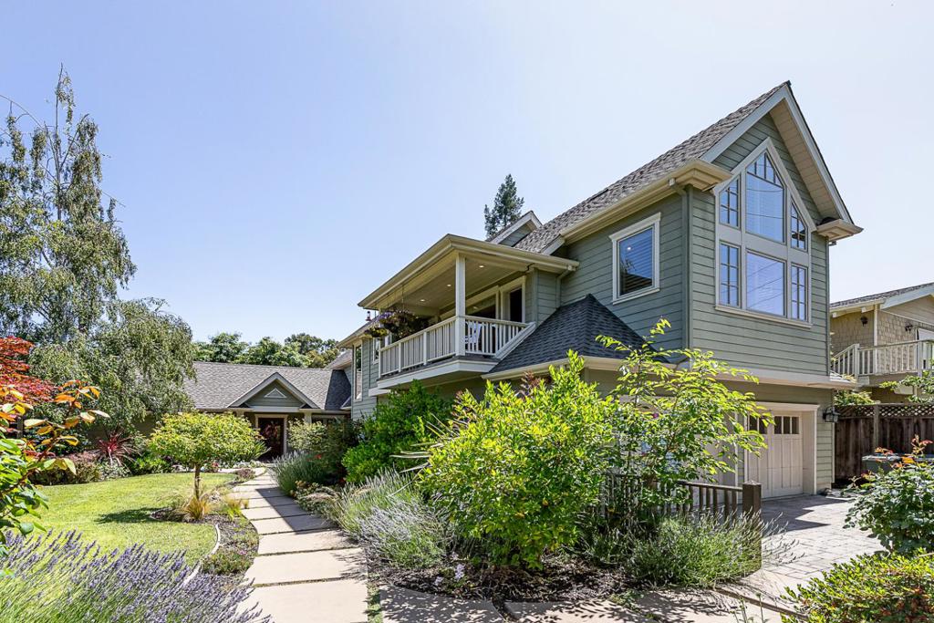 Beautifully rebuilt & expanded, this custom Craftsman home on a one-quarter-acre flat lot showcases timeless design, exceptional quality, & a premier location on the edge of Atherton. Spacious floor plan offers flexibility across two levels with a luxurious upstairs primary suite with private balcony, sumptuous bath, & oversized walk-in closet. Two additional bedrooms & a full bath are also located upstairs, while two main-level bedrooms with direct access to a shared bath. Additional full bath on the main level that doubles as a guest powder room. Formal living & dining rooms flow into a beautifully appointed kitchen with handcrafted rift maple cabinetry, granite countertops, & premium appliances. Wine bar with custom racking & hand-forged iron cabinet fronts is complemented by peninsula counter seating perfect for casual dining or entertaining. Outdoor living with an expansive rear yard designed for entertaining with fireplace, lush lawn, & private patios bordered by mature foliage. A 4-car tandem garage with built-ins & overhead storage & detached oversized workshop & extensive full-height attic offer outstanding storage.Surrounded by exceptional gardens in the front & rear, this home offers privacy, beauty, & livability in one of the Peninsula's most desirable neighborhoods.