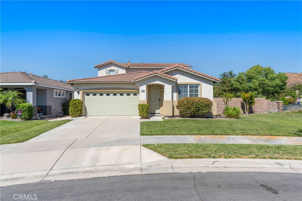 This 4-bedroom, 3-bath home is designed with family in mind. The main floor features two bedrooms and a full bath, plus a living room and family room that flow right into the kitchen—keeping everyone connected. The kitchen has plenty of cabinet space and upgraded countertops. Upstairs, you’ll find a spacious master suite, loft, and laundry room for convenience. There are wood shutters throughout and a backyard built for gatherings—featuring a covered patio, large cemented area, and tranquil waterfall. If you love to golf this home has easy access to Yucaipa Valley Golf Club. If you're an outdoor lover there are plenty of hiking trails near by. You also have the Yucaipa Regional swim complex which is a great hidden water park to take your kids to during the summer.