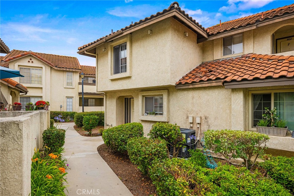 Welcome to 26152 La Real #C400, a beautifully maintained two-bedroom, two-and-a-half-bath townhome-style condo nestled in the sought-after Las Palmas community of Mission Viejo. This inviting residence offers 878 square feet of comfortable living space across two levels, featuring a thoughtful dual-primary suite layout with both bedrooms upstairs—each with its own private full bathroom and walk in closets. The main floor includes a spacious and light-filled living and dining area with vaulted ceilings, powder room for guests, and in-unit laundry for added ease. The kitchen flows nicely into the main living space, making it perfect for both everyday living and entertaining. Enjoy the peace and privacy of a tucked-away location, along with the convenience of a detached garage and additional parking space. The well-maintained community offers residents access to pools, spas, and lush greenbelts, with HOA dues covering water, trash, and exterior maintenance. Located just minutes from Lake Mission Viejo, local parks, hiking and biking trails, shopping, dining, and top-rated schools, this home is perfectly positioned for enjoying all that South Orange County has to offer. You also have access to Lake Mission Viejo and all their wonderful amenities. Whether you’re a first-time buyer, investor, or looking to simplify your lifestyle, this turnkey condo offers a wonderful opportunity to own in one of Mission Viejo’s most desirable neighborhoods.