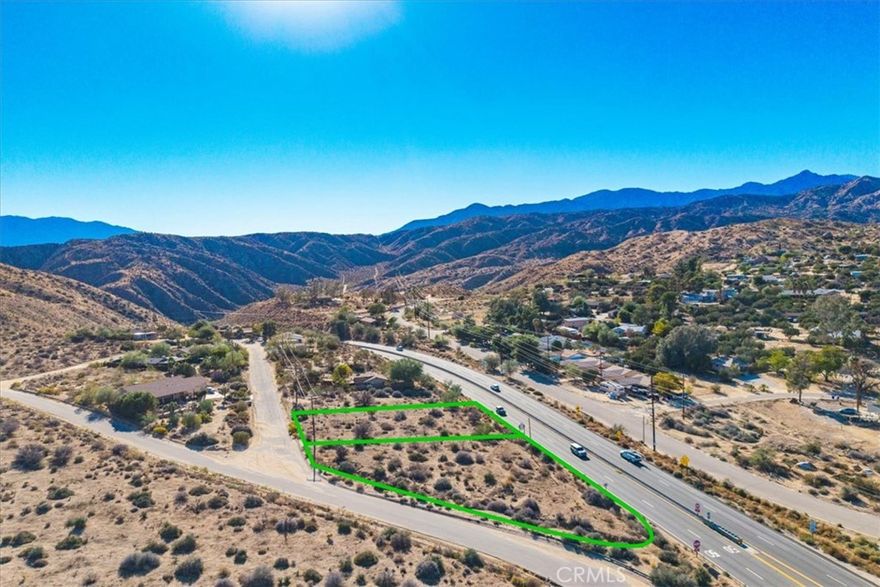 Check out this great opportunity to purchase and develop this picturesque property in beautiful, rural Morongo Valley. Two parcels being sold together totaling just under three quarters of an acre. One on a corner lot which is .49 acres on Hess Blvd. and the other .21 acre parcel included is on Conejo Road. Both parcels have water in the street and power at the property line. With gorgeous homes in and around the land there is great potential to build your dream home. Morongo Valley is a very desirable location being situated between the high and low deserts it is a great jump off spot for travel to either Palm Springs and the cities of the Coachella Valley or Joshua Tree National Park and the developing areas surrounding it. Heading East, Joshua Tree National Park is only 30 Minutes away. In the opposite direction Palm Springs is an equal distance, 30 minutes away. Morongo Valley itself is a beautiful community with some eclectic shops and restaurants including the renowned Spaghetti Western, A Small Town Grill, The Cactus Mart and more prominent locals. And the Big Morongo Canyon Preserve is just a couple of minutes away and is known for it's wildlife (mule deer, great horned owls, bobcats and more), it's bird watching and miles of trails all around a natural oasis in the desert. Come and see this special property. The seller's are also selling package of 5 parcels (80 acres) just down the street, as well as other parcels in Morongo Valley and Yucca Valley.