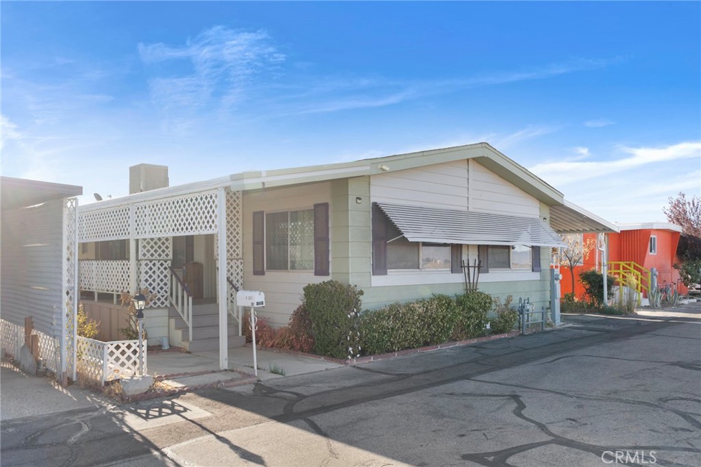 Welcome to your dream of homeownership at 3753 E Avenue I #62! This beautifully renovated 3-bedroom, 2 bathroom mobile home offers 1,440 square feet of modern comfort on a spacious 2,178 square foot lot perfect for first-time buyers ready to build equity instead of paying rent. Step inside to discover a completely transformed interior featuring brand-new flooring that flows seamlessly throughout, fresh paint in contemporary colors, two fully remodeled bathrooms with modern fixtures, and a beautifully renovated kitchen designed for today's lifestyle. With an incredibly low land lease of just $615 monthly (including trash and sewer services), total remain at an affordable $693 per month land lease, representing exceptional value in today's market. Located in a well-maintained mobile home park with community pool access and convenient driveway parking, this home is perfectly positioned with easy access to shopping centers and local amenities. This turnkey property combines modern interior features with affordable community living – ideal for first-time homebuyers, investors, or anyone seeking homeownership without breaking the budget. Don't miss this rare opportunity to own instead of rent in Lancaster's growing market!
