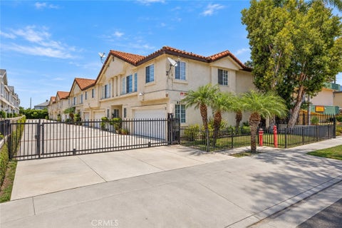 Photo of 9333 Elm Vista Drive #4, Downey, CA 90242 (MLS # OC26199546)
