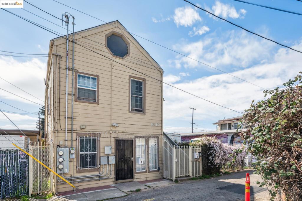 Great opportunity to own a Triplex and receive rental income. Live in the largest two bedroom two bath unit with in unit washer and dryer and collect rental income from unit two and three. There is also a studio unit that has a full bath that previously was rented for $1,200. Two units rented with good long term tenants. Secured gating in the front and the back and ample amount of parking space. Separate PG&E and EBMUD meters. Large attic with electricity and storage. Private Sewer Lateral Certificate and Sidewalk Certificate Compliant. Recent Home Inspection and Termite and Pest Inspection available. Seller completed several of the Section 1 items. First time on the market in 28 years. Great Investment Opportunity in up and coming Neighborhood. Easy access to freeways and public transportation.