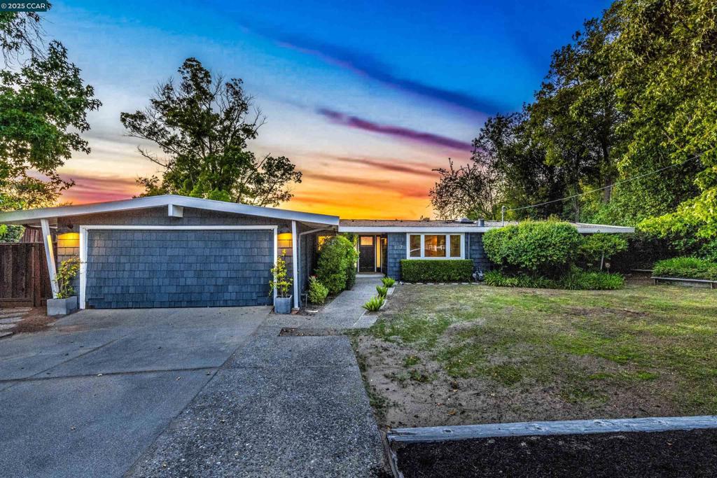 Welcome to this stunning single-story 4-bedroom, 2-bathroom home located in one of Orinda’s most sought-after neighborhoods. Nestled in the heart of Glorietta, this beautifully updated mid-century modern home offers breathtaking views and an open floor plan designed for modern living. The completely remodeled kitchen is a chef’s dream, featuring sleek finishes, updated appliances, and a seamless flow to the dining and living areas—perfect for entertaining and day to day living. Both the primary suite and hall bathroom have been tastefully renovated with designer fixtures and custom tile work. Enjoy vaulted ceilings, newer flooring, fresh interior paint, and thoughtful design touches throughout. Step outside to relax or entertain while taking in the incredible views. The setting is peaceful and private, yet just minutes to downtown Orinda, the Orinda BART station, and Hwy 24. Zoned for top-rated Glorietta and Orinda schools, this home truly checks all the boxes for location, style, and comfort. Views: Downtown, Ridge