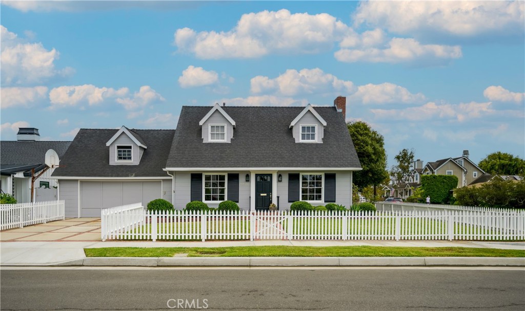 Vintage Coastal Charm in the Heart of Huntington Beach
Welcome to this beautifully restored 1956 Cape Cod-style home with Colonial Revival influence, located on a coveted corner lot in one of Downtown Huntington Beach's most desirable neighborhoods. On the market for the first time since 1988, this timeless treasure offers a rare opportunity to own a piece of local history—just steps from Lake Park and a short walk or bike ride to the beach, pier, and vibrant downtown shops and restaurants.
From the moment you arrive, the curb appeal is undeniable. A full green lawn framed by a classic white picket fence wraps the corner lot, basking in ideal sun exposure throughout the day. The inviting formal entry leads to a warm and spacious living room, where the original fireplace is perfectly centered, creating a cozy focal point. Flanked by double-hung windows and charming built-in bookshelves, the space exudes character and comfort.
As the sun moves through the sky, this home takes on a life of its own—shifting moods and lighting to create an ever-changing, enchanting atmosphere. The kitchen is a nostalgic nod to its mid-century roots, featuring original blue square tile countertops, matching blue cabinetry, and oak hardwood floors that continue into a secluded, intimate dining room perfect for hosting guests or quiet dinners at home.
The main-level primary bedroom offers convenient single-story living, while three additional bedrooms upstairs provide flexibility for family, guests, or a home office.
This is more than just a house—it's a lifestyle. With vintage charm, unbeatable location, and the kind of curb appeal that turns heads, this home offers the perfect blend of classic beachside living and timeless design.
Don't miss this rare chance to make a true Huntington Beach classic your own.