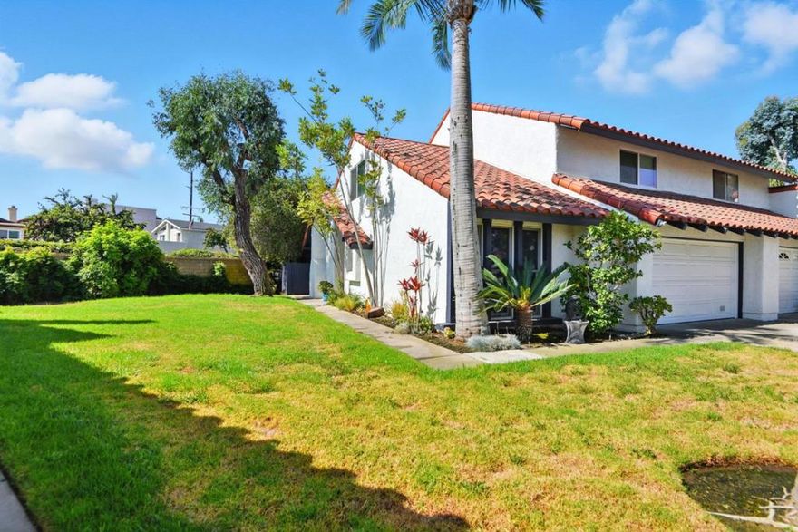 Modern coastal comfort meets everyday convenience in this beautifully renovated 3-bedroom plus loft, 2-bath home with 1,733 square feet of living space. High ceilings and wide windows bring light into the living area.    The dining room sparkles under a crystal chandelier, set beside the open kitchen. Here, youll find a Quartz Calcutta Gold waterfall island, a Kraus stainless steel sink, and premium fixtures ready for both cooking and entertaining. Pendant lights highlight the breakfast bar, and a stylish backsplash adds texture against crisp white cabinetry. Smart upgrades like a Nest thermostat, Nest smoke and CO detectors, and fresh Behr designer paint in Blank Canvas (2023) enhance the homes move-in-ready appeal. A versatile loft offers flexible use for an office, gym, or guest retreat.   Parking is never an issue with a private 2-car garage plus driveway space for up to 4 vehicles. From here, youre less than a mile from Downtown Huntington Beach, the Pier, Pacific City, and local parks, with quick access to the 405 and PCH. Zoned for highly rated Huntington Beach schools, this location balances lifestyle and convenience.  *Two pets allowed. Pet weight limit is 100 lbs - if your pet exceeds this, please reach out to see if we can accommodate!
