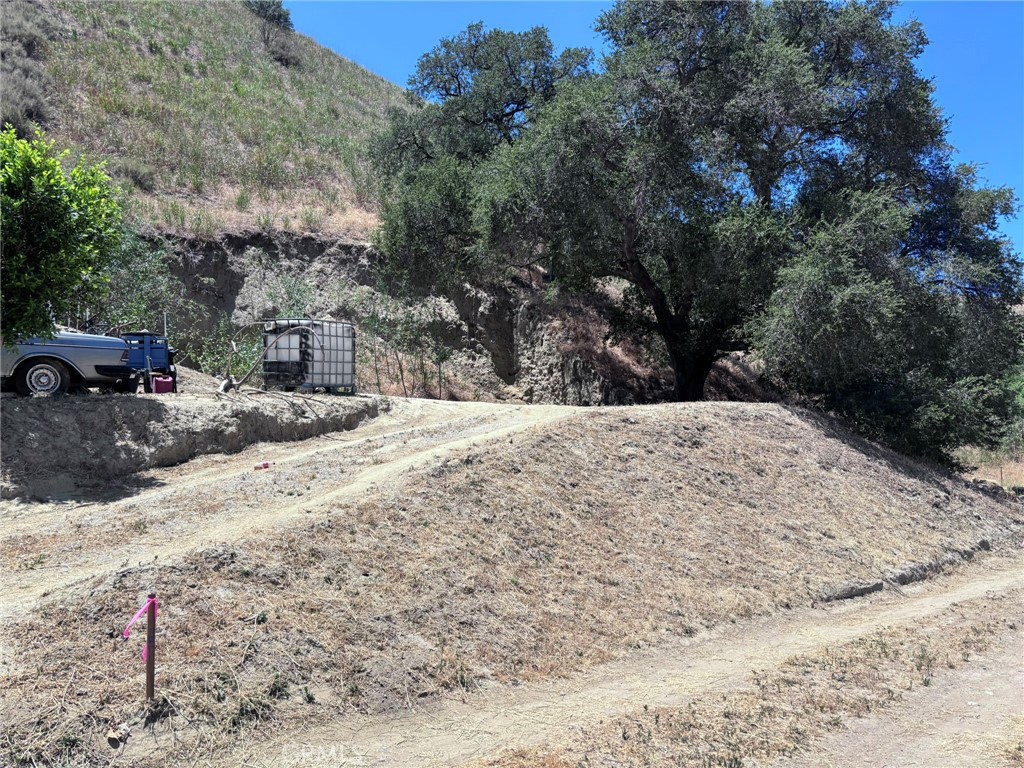 Welcome to a serene and expansive lot on Elvira Road in Val Verde, CA! This remarkable 27,445 square foot parcel offers a wonderful opportunity to bring your vision to life. With a buildable area located at the front of the lot, you have the perfect setting to design and construct a home tailored to your preferences.
The lot features a hillside towards the back, adding a touch of natural beauty and privacy. Enjoy the mountain views. Embrace the tranquil environment and the potential to create a peaceful retreat in this charming community.
Located in the inviting Val Verde area, you'll enjoy the quiet surroundings while being part of a welcoming community. This is a superb opportunity to invest in your future and create the lifestyle you've always envisioned.