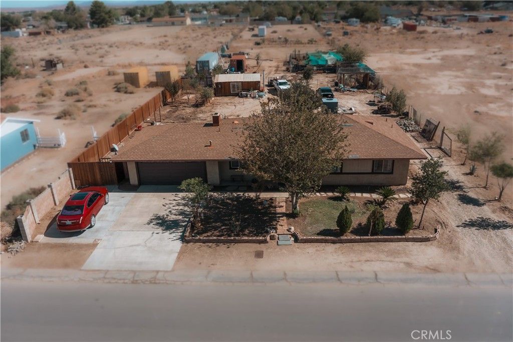 Photo of 40964 156th St E, Lancaster, CA 93535 (MLS # CV25243974)