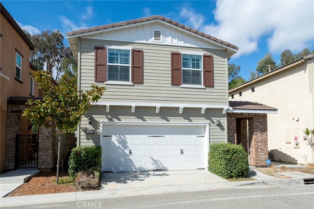 WOW—PAID OFF SOLAR! This is an incredibly rare opportunity to own a piece of the WINE COUNTRY in the highly sought-after community of Indigo Place. Perfectly situated, this home offers unmatched convenience—just minutes from Old Town Temecula, the 15 freeway, and world-renowned wine country. Plus, it’s within walking distance to some of Southern California’s top-ranked schools. Inside, you’ll fall in love with the open-concept design. The spacious living room flows seamlessly into the chef’s kitchen, complete with an island and sink, making it perfect for entertaining or everyday living. Upstairs, the loft provides flexible space for a home office, playroom, or relaxation area, while each bedroom is designed with comfort in mind. The backyard feels like a private retreat, featuring a lush 12ft+ wall of ivy that creates rare seclusion. Low-maintenance concrete hardscaping runs throughout the back and side yards, and the side gate offers extra privacy and safety. This home is better than new, combining a fantastic floor plan, a phenomenal location, and a welcoming neighborhood. Upgrades include: luxury vinyl plank flooring on the lower level, laundry room, and all bathrooms, plantation shutters on all window, a QuietCool whole-house fan, a LiftMaster Wi-Fi garage opener, and two Honeywell Pro-Series thermostats, and Eufy WIFI deadbolt. To top it off, ALL MAJOR APPLIANCES are included, making this home truly move-in ready!