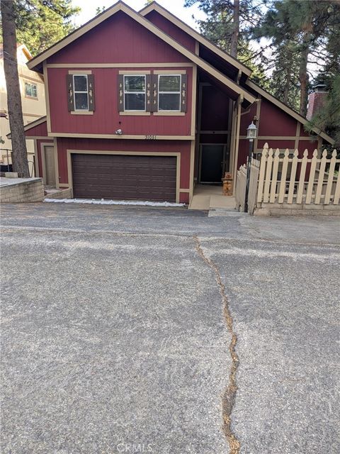 Photo of 31051 Wild Oak Dr, Running Springs, CA 92382 (MLS # SR26074133)