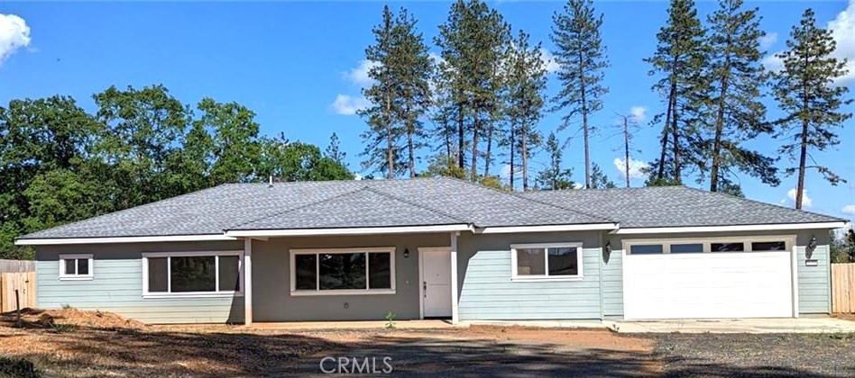 Welcome to your peaceful retreat in Paradise! Built in 2022, this 3 bedroom, 2 bathroom move-in ready home is nestled on a spacious lot in a peaceful, quiet neighborhood—perfect for those seeking comfort, space and quiet surroundings. Inside, you'll find a bright and airy floor plan filled with lots of natural light. The open-concept kitchen is designed for both function and style, featuring solid surface countertops, ample storage, rich dark cabinetry and a sit-up bar for additional seating. It flows seamlessly into the living and dining areas, creating a welcoming space to relax or entertain. The primary suite is an airy space with a beautifully designed ensuite bathroom featuring a large step-in shower with dual shower heads, plus generous counter space and storage. The second bathroom also offers lots space and storage, perfect for guests or family. The laundry room continues with the beautiful cabinetry and storage with a door leading to the back yard. The fully fenced backyard is a blank canvas, ready for a pool, gazebo, garden or playhouse. There is expansive parking space for a large RV and or/boat storage. Whether you're looking for a modern home with room to spread out or a property that blends comfort with convenience, this Paradise gem has it all!