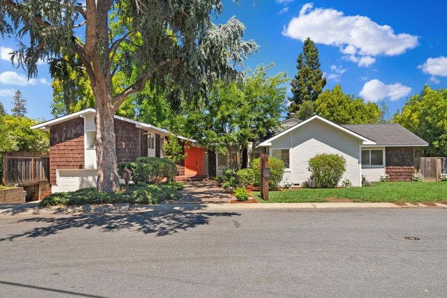 An extraordinary home nestled in the North of Los Altos, this home offers luxury living with its seamless fusion of elegance, meticulous design, and unparalleled accessibility. Perfectly situated for commuters, it caters to discerning buyers who appreciate both sophistication and convenience.This distinguished home boasts two primary suites, generously-sized bedrooms, and a study retreat with a wood-burning fireplace. The grand living room features soaring ceilings, there is a  formal dining room and expansive family room graced with vaulted ceilings and floor-to-ceiling windows that invite an abundance of natural light. The lushly landscaped grounds evoke the ambiance of a private resort, complete with a shimmering pool and spa, a classic diving board. Every day feels like a vacation in this serene oasis. Positioned within one of the Bay Area's most prestigious neighborhoods, this residence offers proximity to renowned top-rated schools and the charm and convenience of downtown Los Altos. For those in pursuit of an extraordinary lifestyle at the epicenter of it all, this home extends an invitation to an unparalleled living experience.