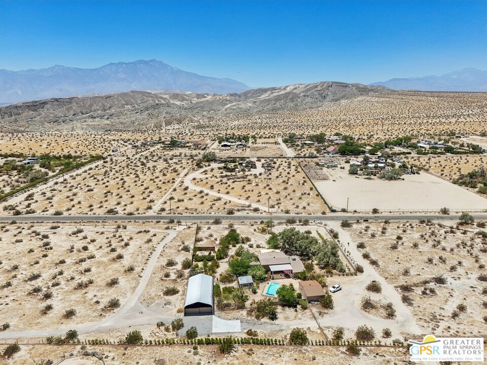 Welcome to the Desert Rose- one of the rare jewels of Sky Valley! This highly maintained home and acreage will delight any buyer. Owners have labored for thirteen years to create lush desert paradise just for You! Professional landscaping adorns the inner courtyard with inviting pool. All that is missing is You! Main house has smart open floorplan. The 10' ceilings convey an expansive ambiance . 360 degree views from abundant windows. Kitchen features granite counters, custom cabinetry and a handy pantry. Custom Barn Door separates bedrooms from Great Room. Master bedoom has it's own door to pool and overlooks desert. Bathrooms feaure custom tile and granite counters. Third bedroom is detached. 28X20! workshop is great for hobbies. Store toys, MotorHome and vehicles in the HUGE 30x60 ft steel Quonset garage with cement flooring! Pool is heated with a super efficient heat pump. Pool heating bills average $50/month! Electric power is supplied by Imperial Irrigation District, which is much lower than SCE. Many unique picturesque tranquil areas to enjoy. Adjacent 5 acres could be purchased concurrently.Original structure built in 1953. Extensive remodeling and addition in 2003 with permits.