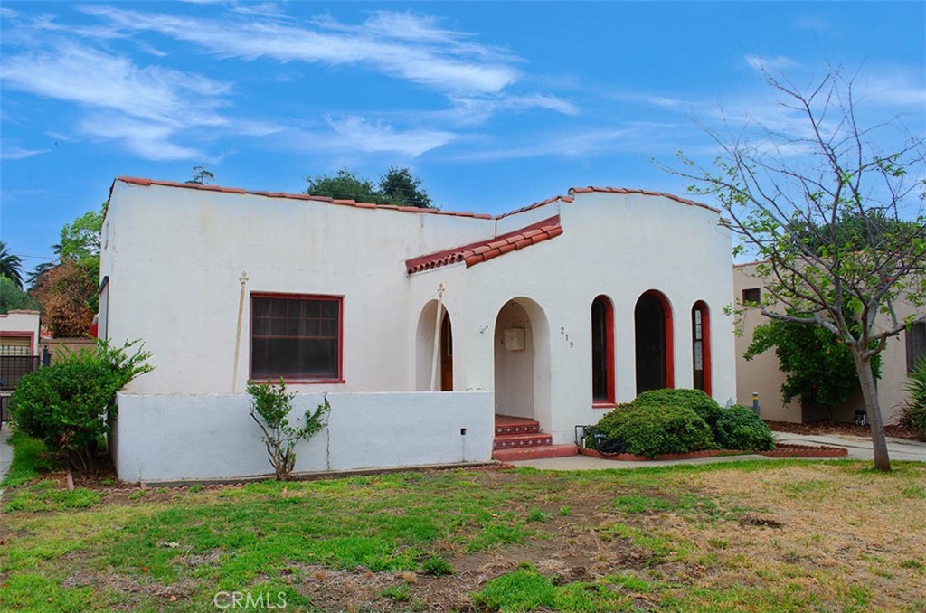 Seize this opportunity for yourself in the Rosewood Court Historic District of north Ontario. Located near schools, shopping and freeway access this property awaits your vision and TLC. You have a great starting point with the Mediterranean Revival style including original features still in place. Built in 1928 it has 3 bedrooms, 1.5 bathrooms, just over 1,600 sq.ft. and oozes with character. For example, take a look at those beautiful windows in front. Inside you have wood floors with a layout to maximize living space for today’s lifestyle. The kitchen offers so much square footage your creativity starts before making your first meal including an area for laundry. Once complete inside, step outside to the large, flat, shaded backyard. Take control of the outdoors to shape the landscaping just as you wish. You won’t find another opportunity with so much upside potential. This is the project you’ve been looking for! Come to Rosewood Court to etch your mark in history!